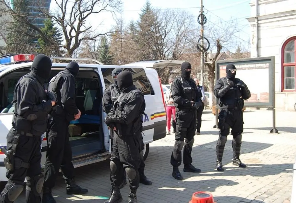 Acțiune de amploare într-un dosar de trafic de influență
