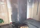 Două femei au urcat pe acoperișul unui bloc de spaima unui incendiu