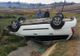 Fără permis și sub influența băuturilor alcoolice, s-a răsturnat cu mașina (FOTO)